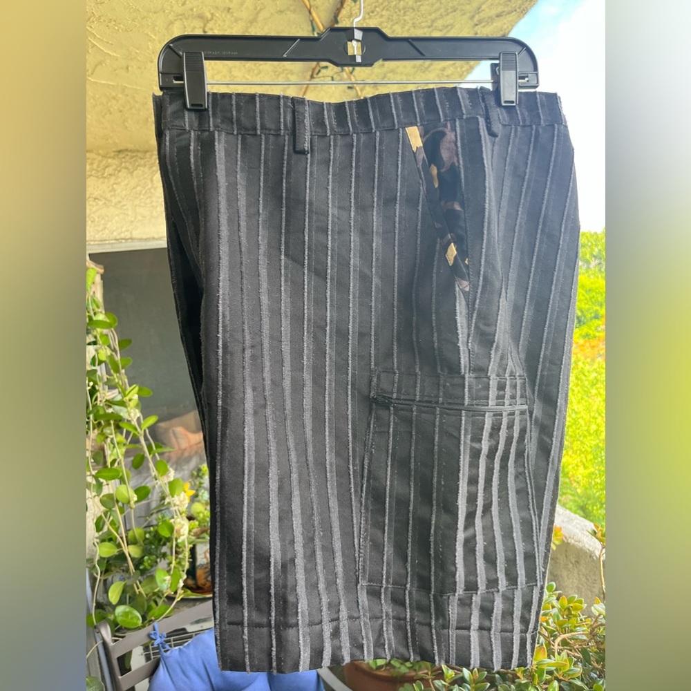 Custom made cargo shorts 42” waist, measuring 19” long. One of a kind